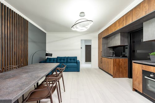 Modern kitchen interior with furniture in light house