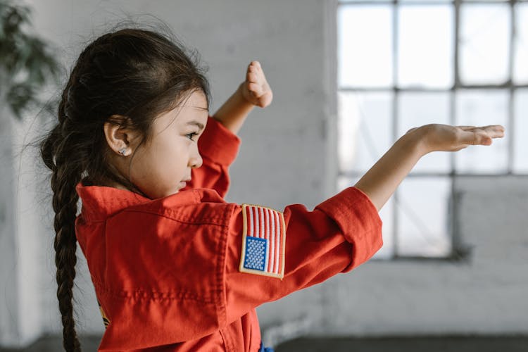 Photo Of A Child Wearing Red Dobok