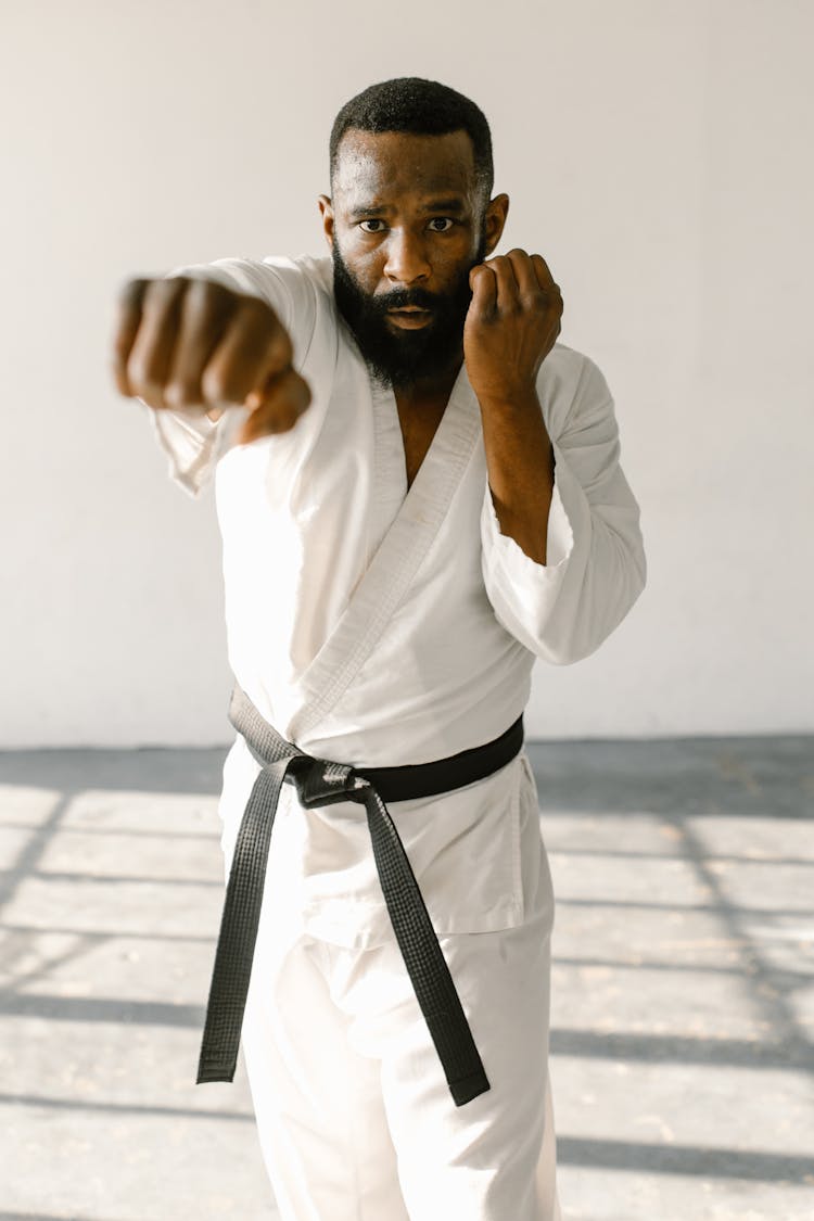 A Bearded Man Doing A Straight Punch 