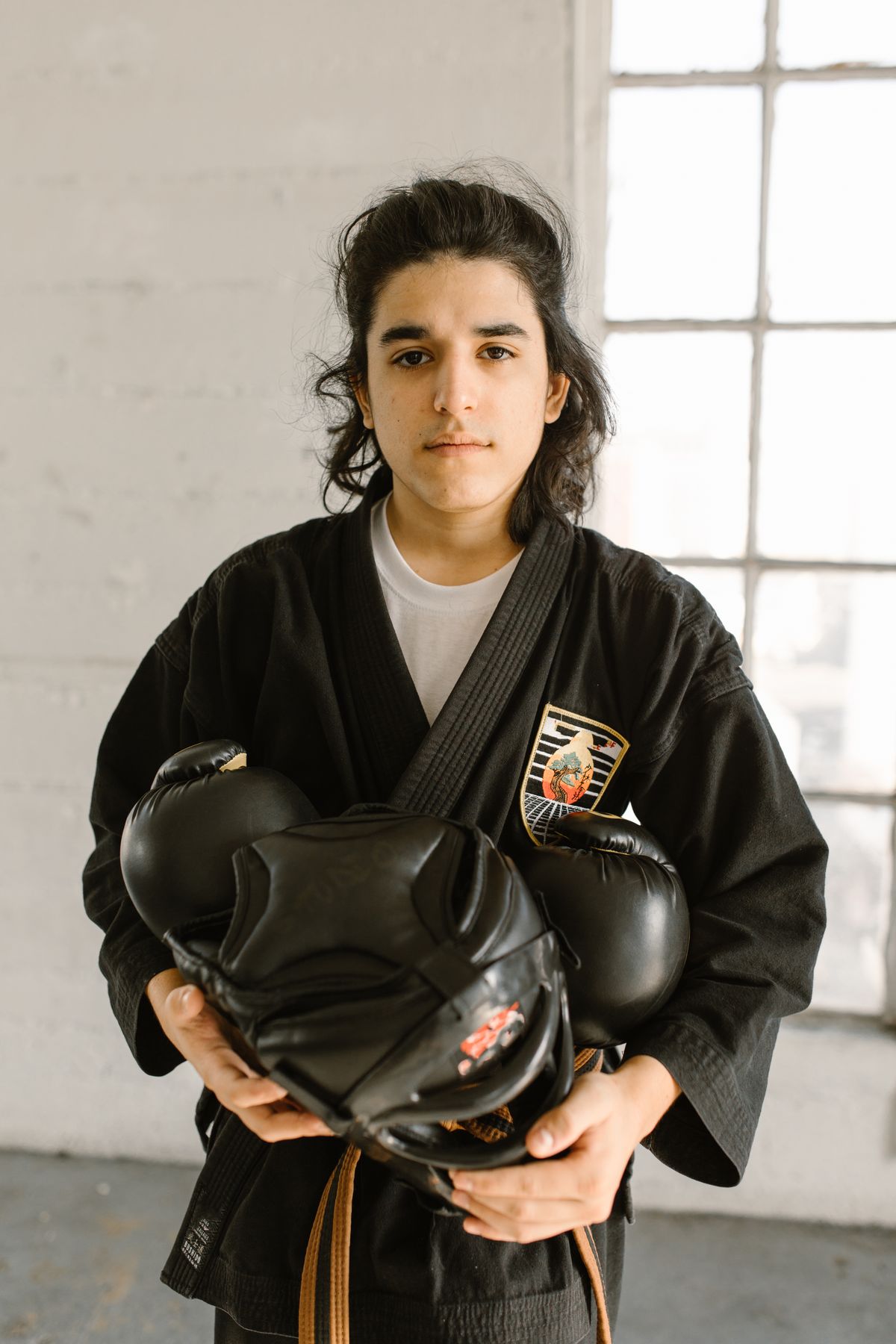 Karate athlete wearing protective gloves