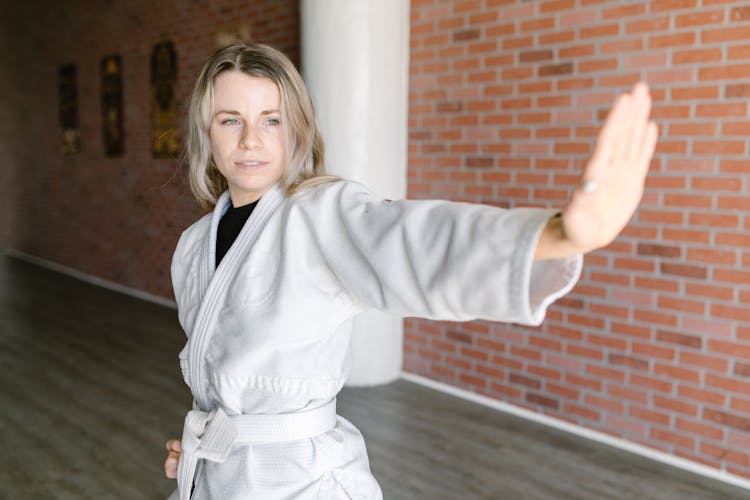 A Woman In Karate Position