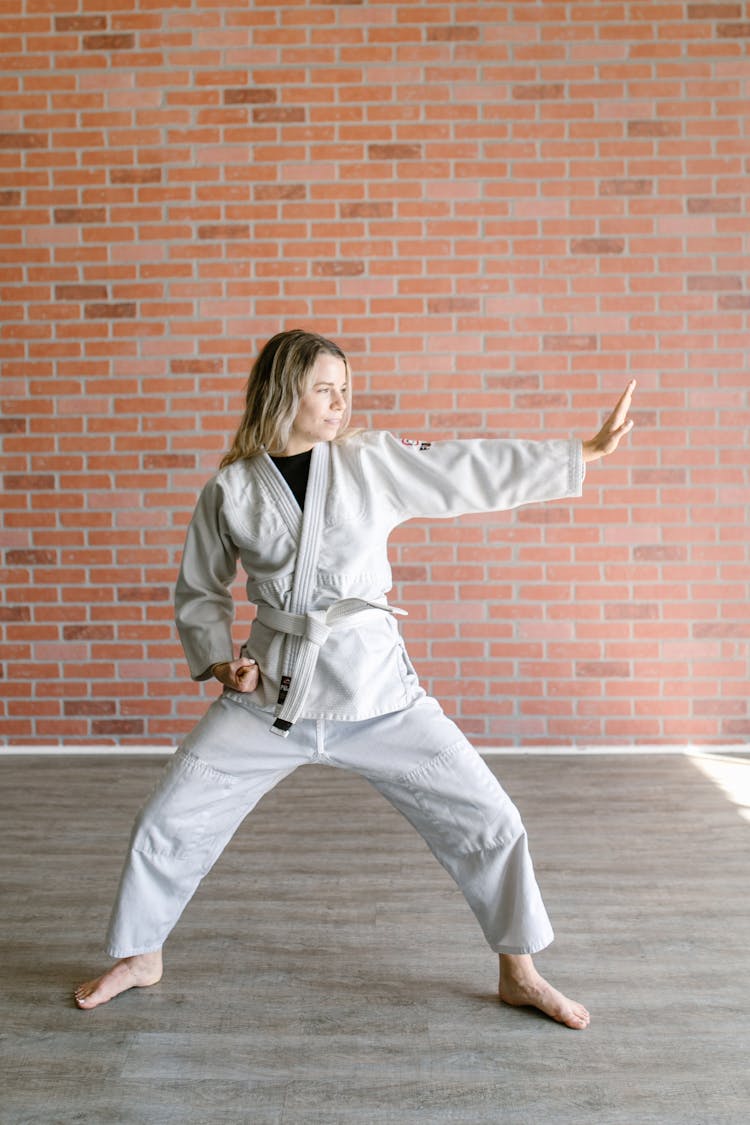 A Woman In Karate Position