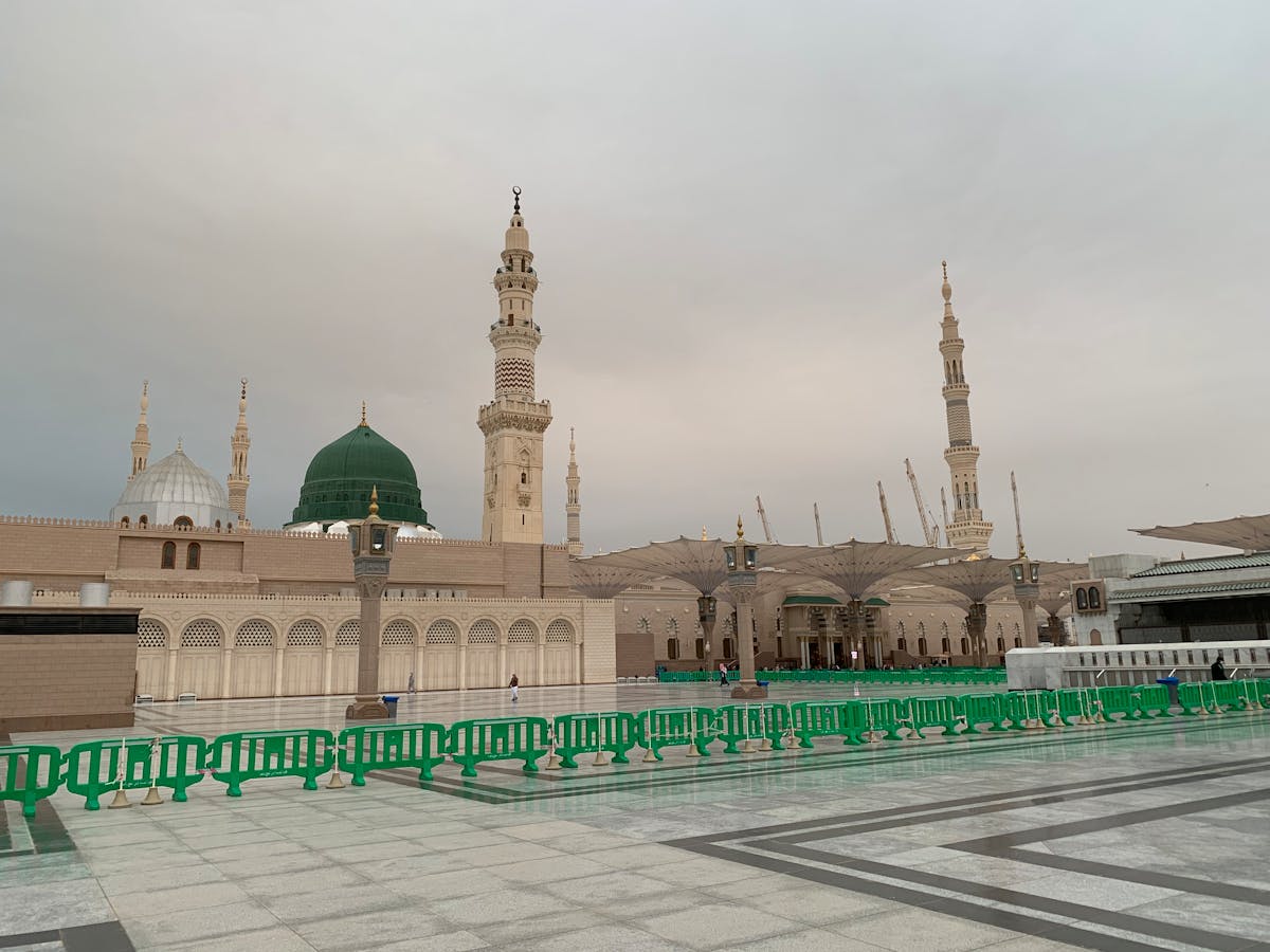 A bowl of thick, creamy cottage cheese dessert topped with chocolate and nuts