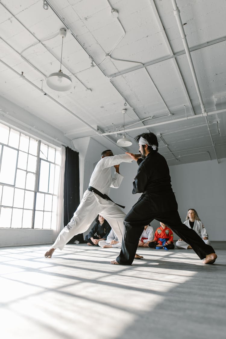 Men Sparring In The Room