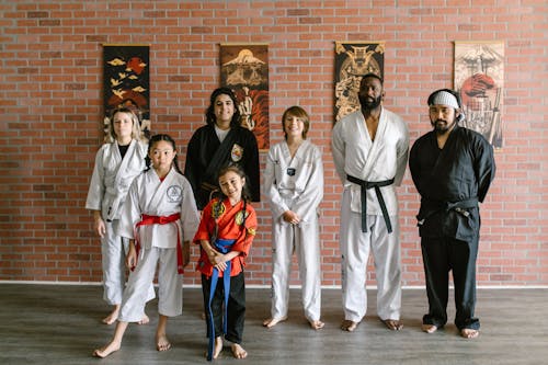 Free Group of People Standing on Floor Wearing Karategi  Stock Photo
