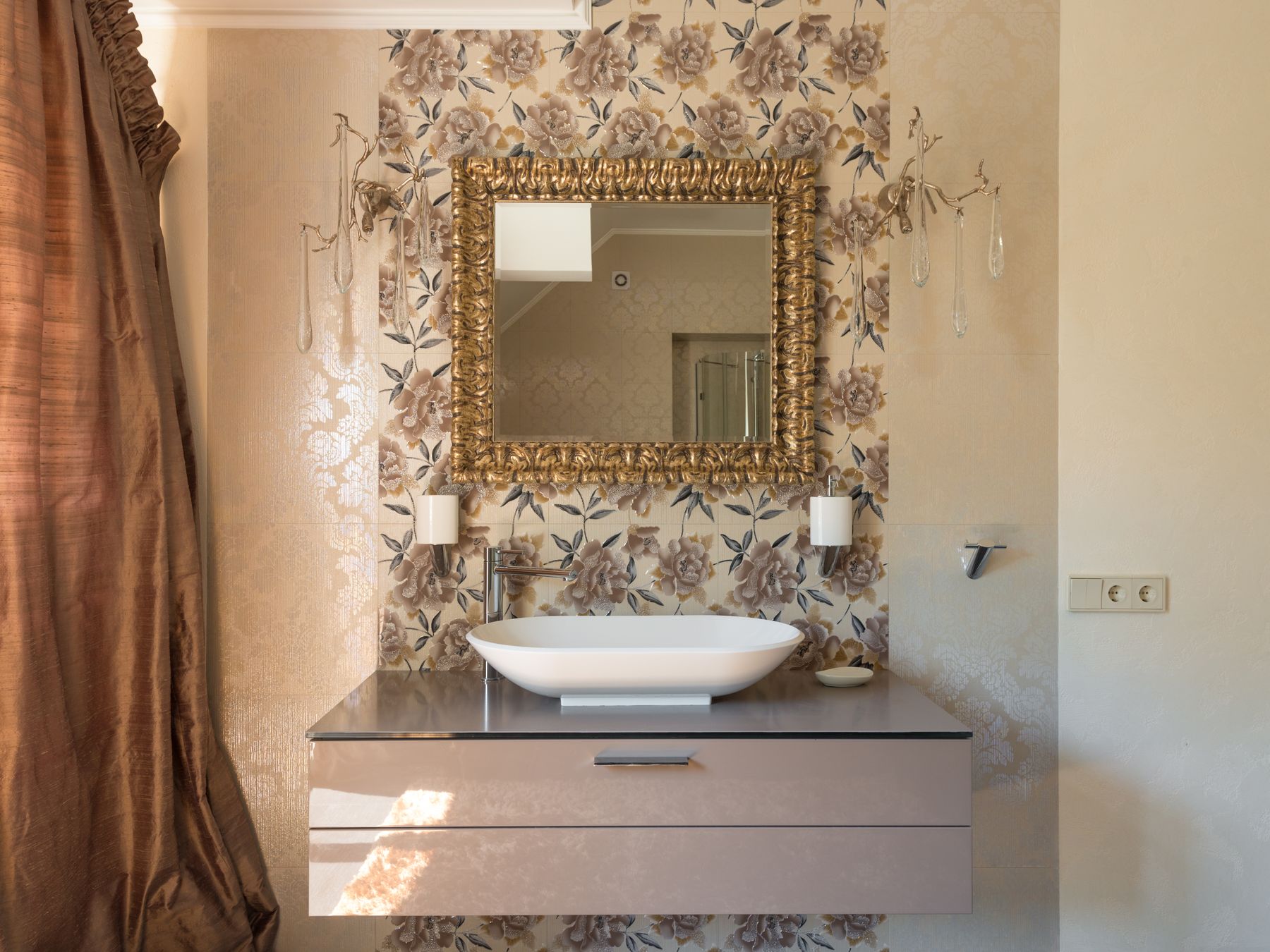 Wallpapering in Kingston Vale — clean edges cut in around trim and sockets
