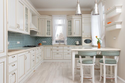 Free Kitchen with cabinets and table with chairs Stock Photo