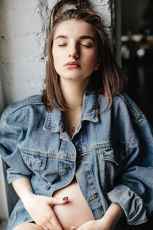 Woman in Blue Denim Button-up Jacket