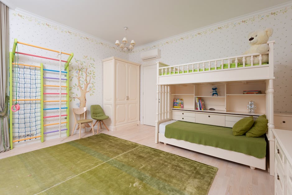 Adorable Kids Room In Green Color With Bright Colorful Bedding And Beige  Carpet Floor .Northwest, USA Stock Photo, Picture and Royalty Free Image.  Image 61425641.