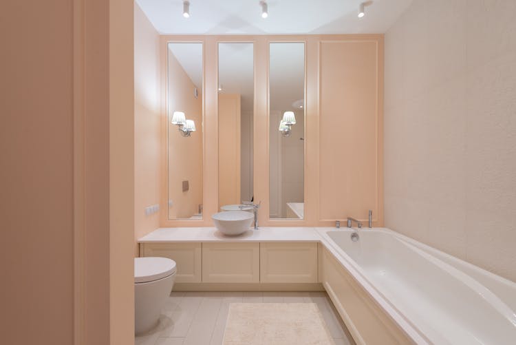 Interior Of Light Bathroom With Beige Walls