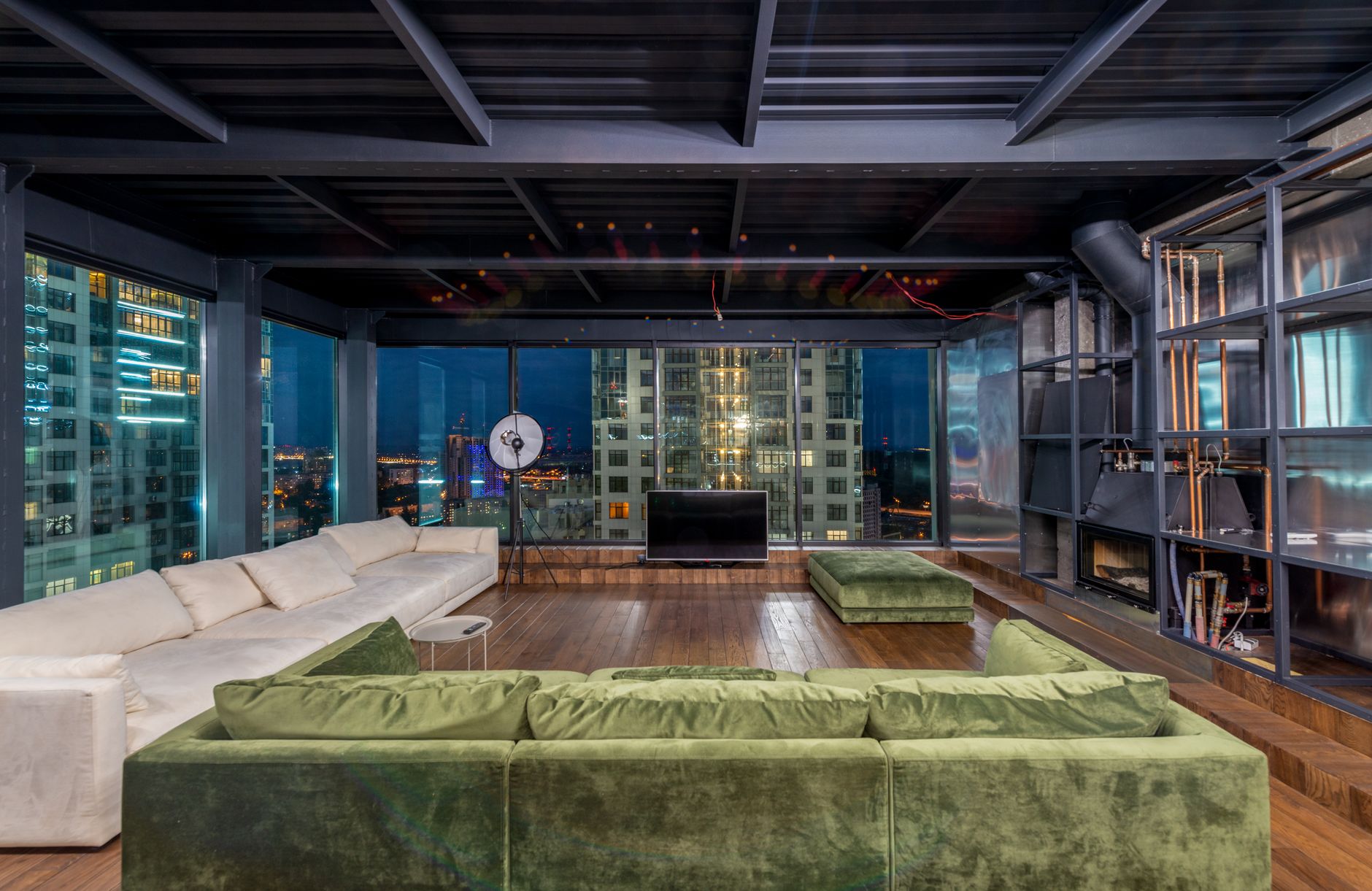 A refined, minimalist professional setting overlooking a global financial district at dusk.