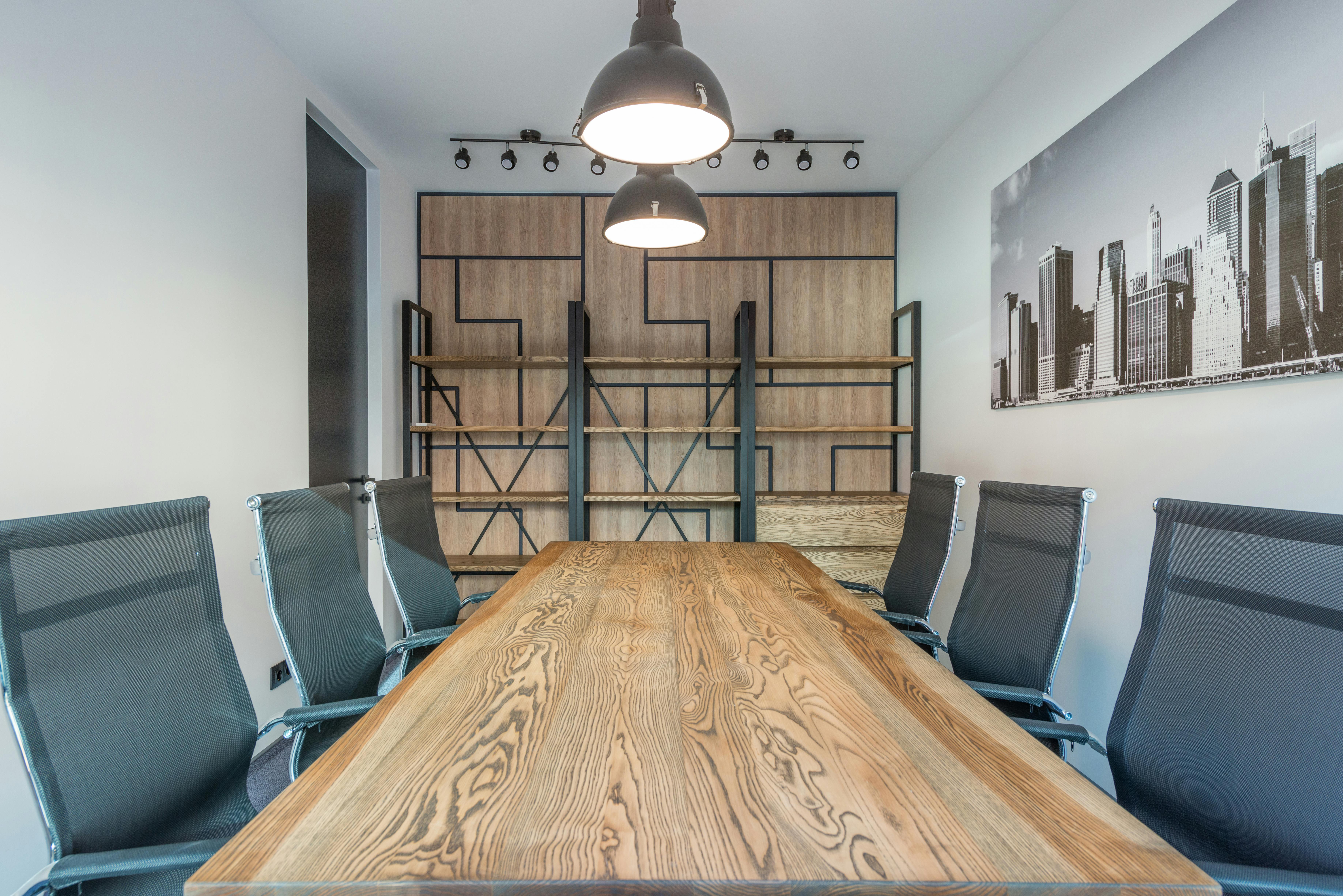 modern workplace interior with table under lamps