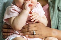 Person Holding Babys Hand