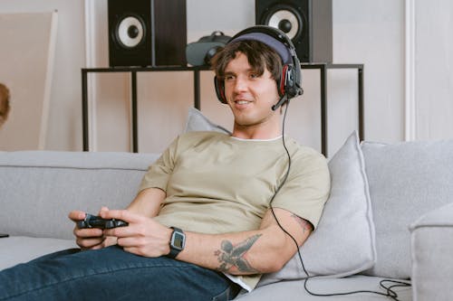 Free A Man Playing a Video Game Stock Photo