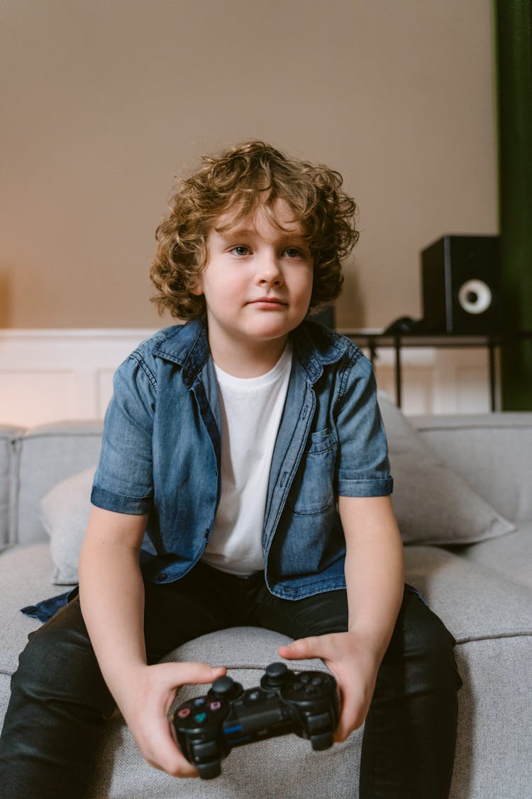 Kid Holding A Video Game Controller