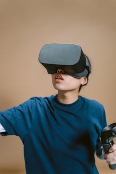 Person engaged in virtual reality gaming with VR headset and controller.