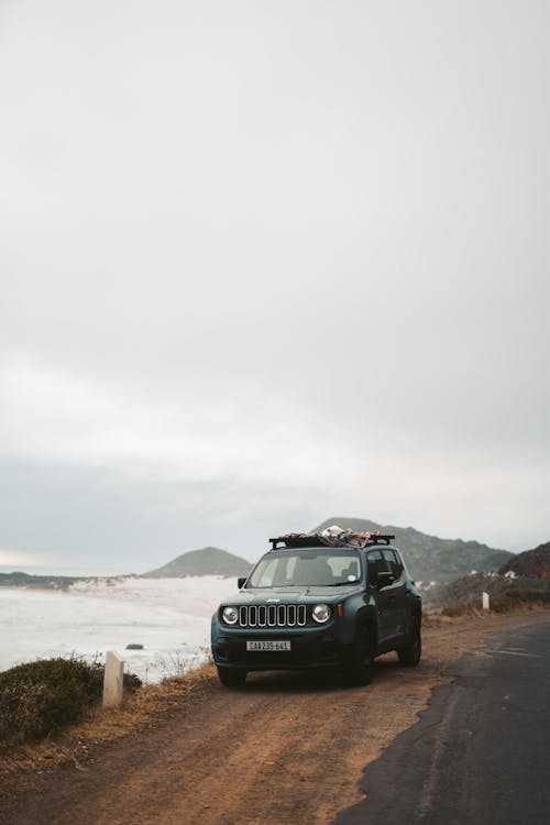 A Black Jeep Parked on the Roadside