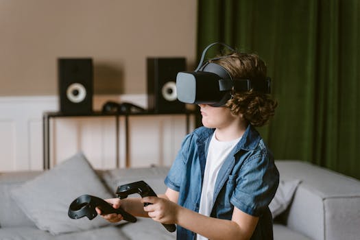 A young boy enjoys a virtual reality experience with a VR headset and controllers indoors.