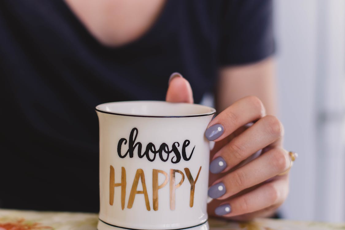 Free Selective Focus Photography of Person Touch the White Ceramic Mug With Choose Happy Graphic Stock Photo