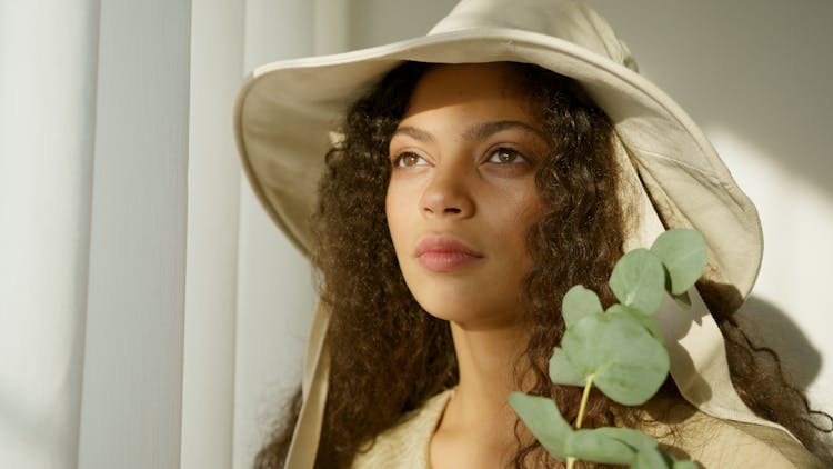 Woman In White Hat