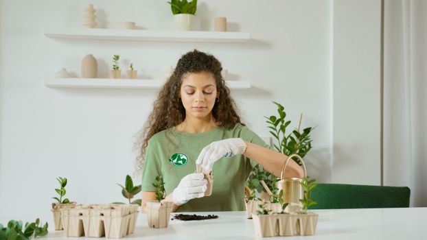 Woman in Green Crew Neck T-shirt Planting
