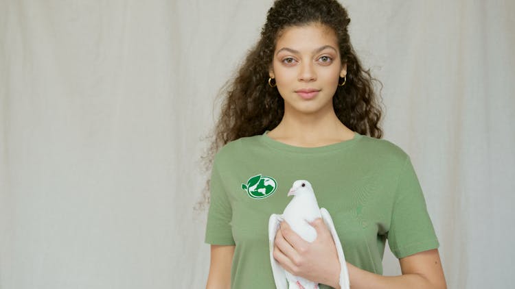 Woman Holding White Dove