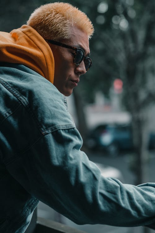 Man in Denim Jacket Wearing Sunglasses