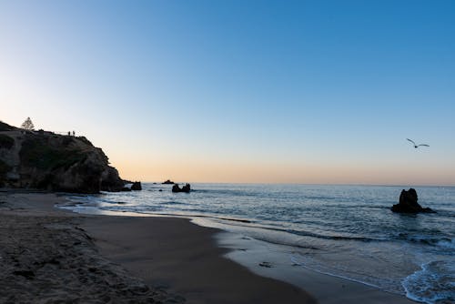 Безкоштовне стокове фото на тему «берег моря, Захід сонця, мальовничий»