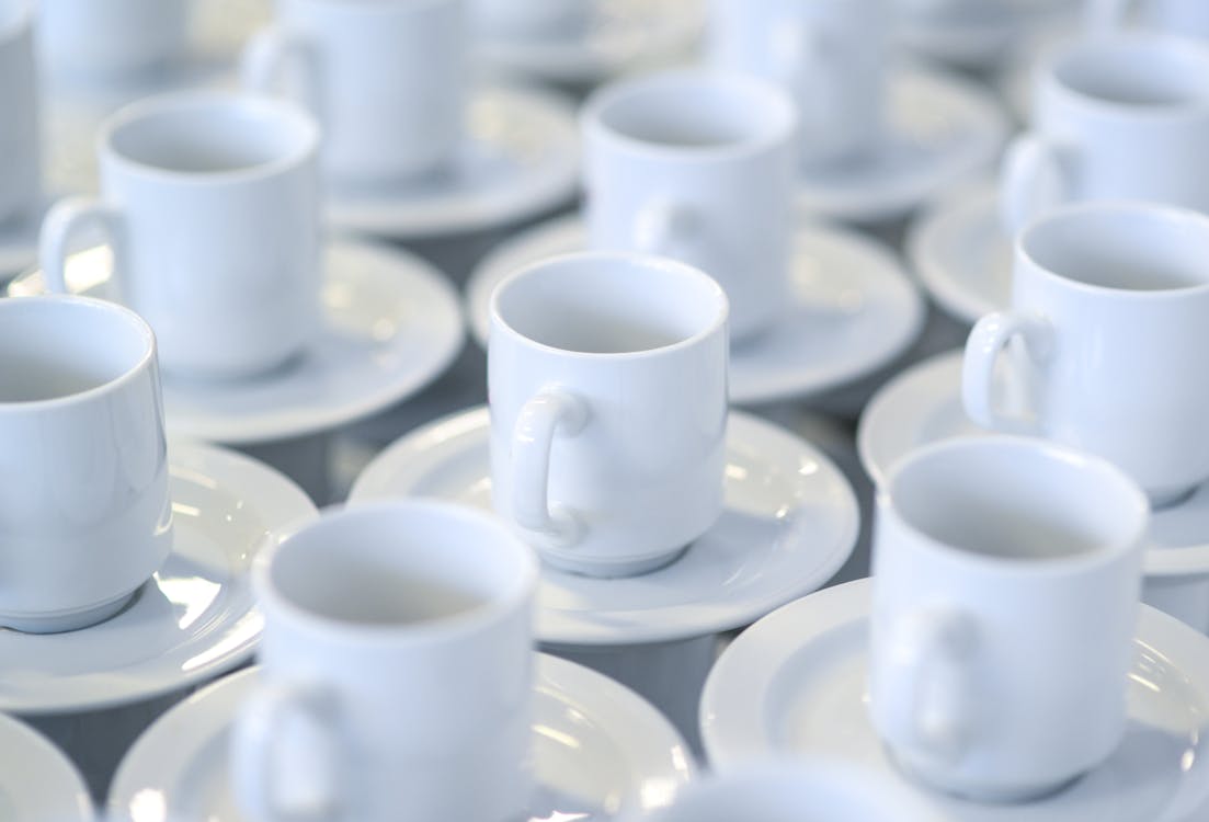 White Ceramic Teacups With Saucers