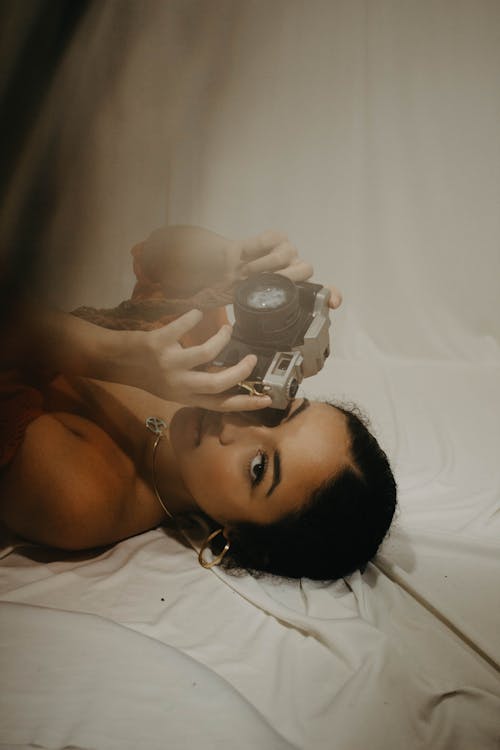 A Woman Holding a Camera