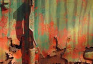 Close-up of an Old Rusty Door with Peeling Paint