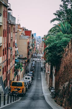 Captivating view of a vibrant street in Barcelona, highlighting urban architecture and everyday life.