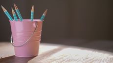 Blue Pen in Purple Cup