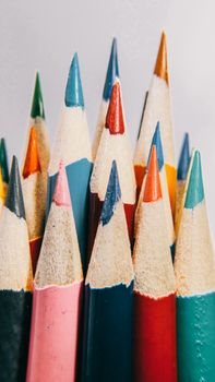 Close-up of sharpened colored pencils displaying a vibrant arrangement of colors.