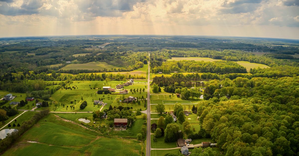 Discover the scenic aerial view of Valley City, Ohio, showcasing lush greenery and rural charm on a sunny day.