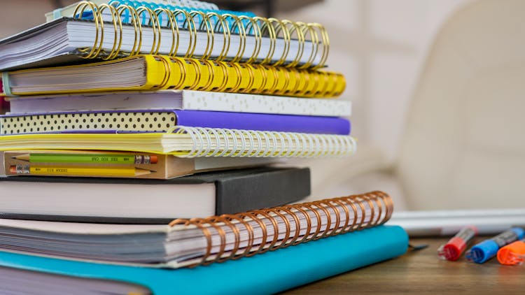 A Stack Of Notebooks 