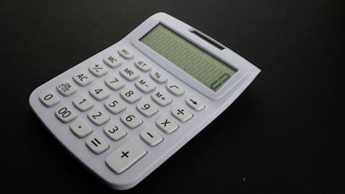 Free Calculator on Black Surface Stock Photo