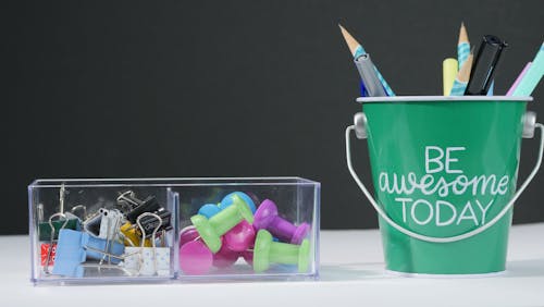 Photograph of Pins Beside Paper Clips