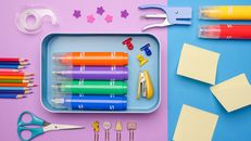 Multi Colored Pen Set on Orange Paper