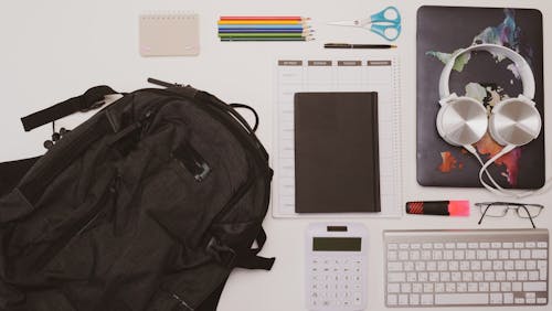 Gratis stockfoto met backpack, balpen, bloc note