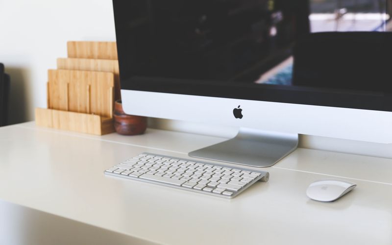 Clean modern home office workspace with an iMac