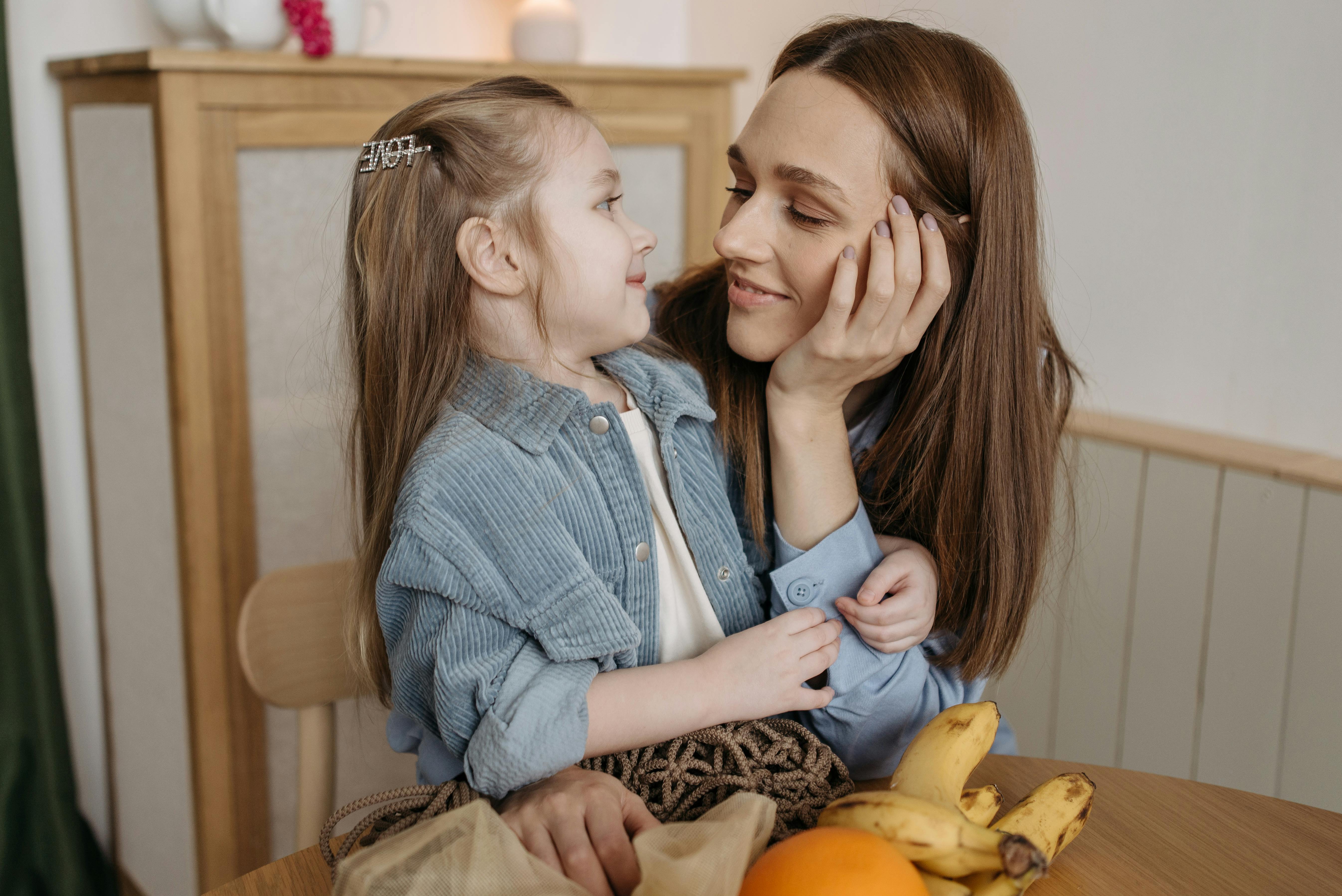 mother and daughter looking at each other