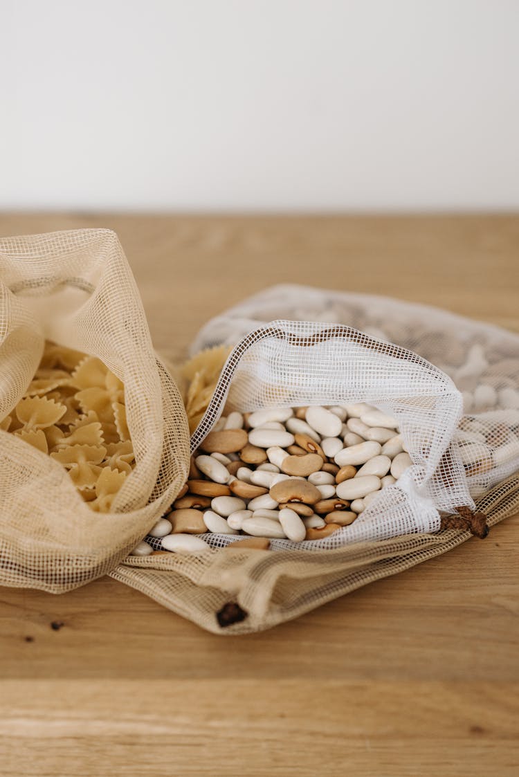 Photo Of Beans Near Farfalle Pasta