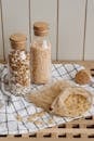 Clear Glass Jars With Cork Lid on Cloth