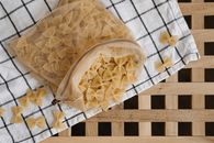 Uncooked Pasta in a Drawstring Mesh Bag