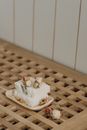 White Ceramic Figurine on White Tray