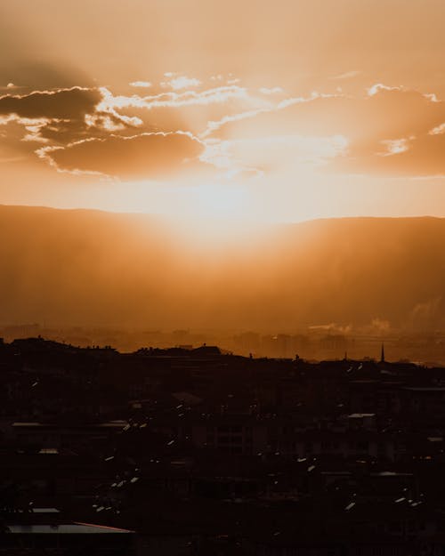 Brightness from the Sun Setting Behind the Mountain