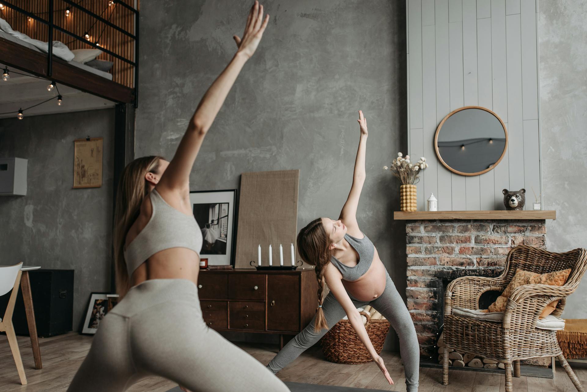 A Pregnant Woman Exercising with a Trainer