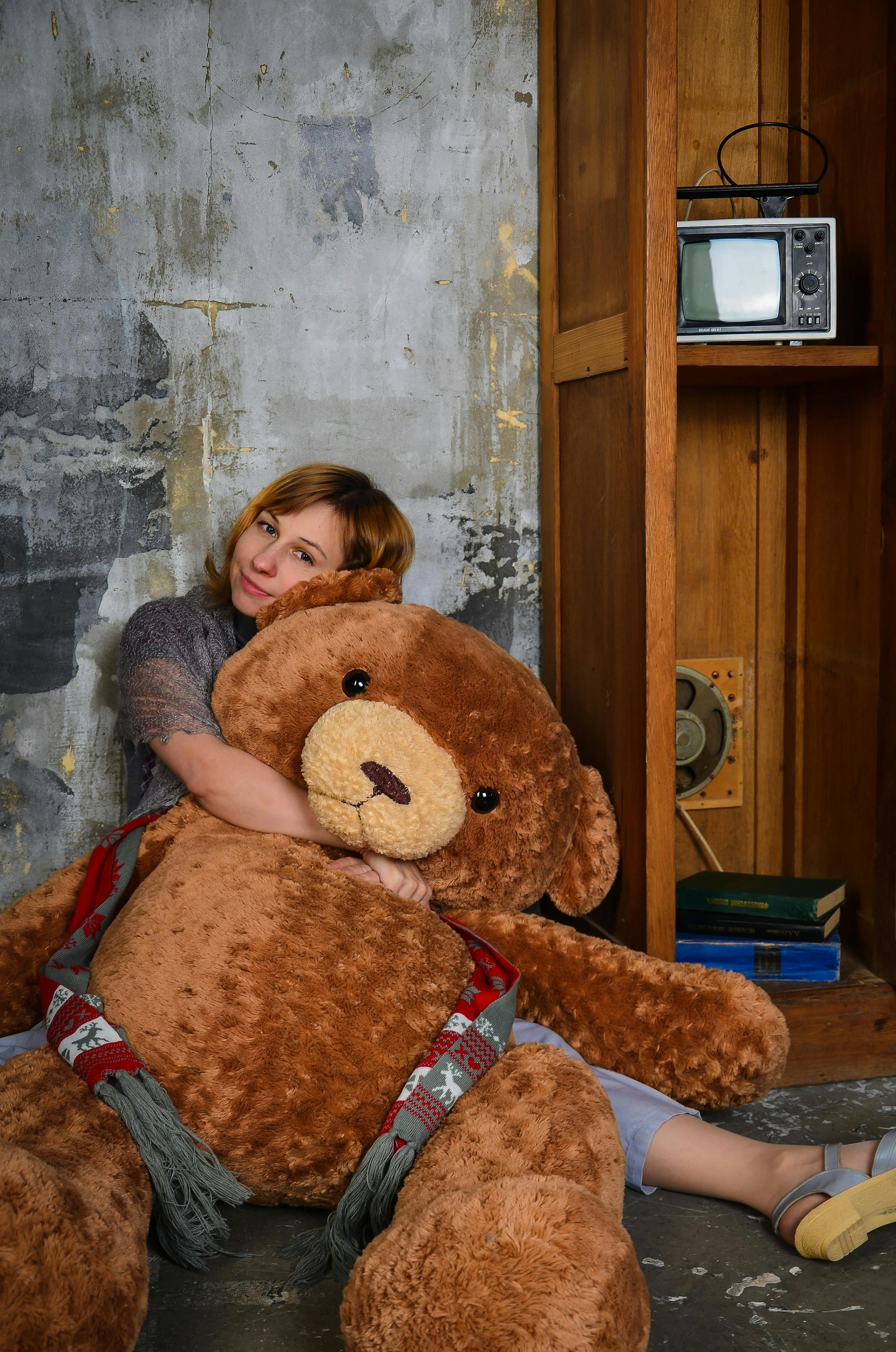 Girl with deals giant teddy bear