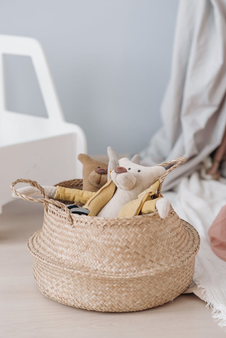 Stuffed Toys Inside A Woven Basket